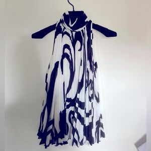 St. John black and white sleeveless top.